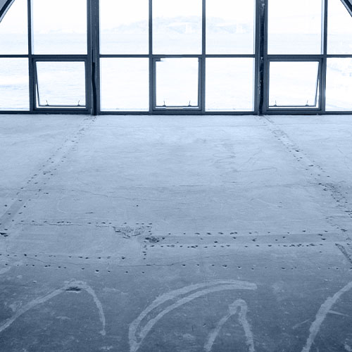 Empty warehouse with grinded floor