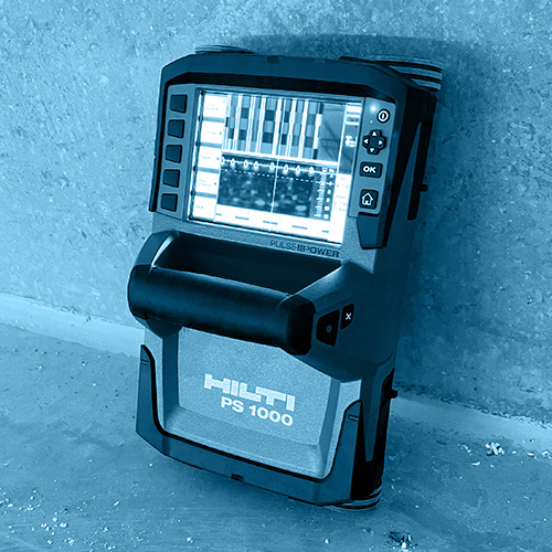 Wet concrete pouring down funnel